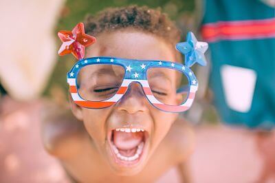 Boy with cool glasses using his voice